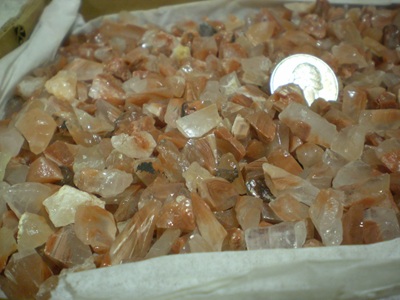 Tumblable red calcite, 3/8 inch average width.